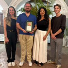 Left to Right: Caitlyn Kelley ’26, Rich Neri ’26, Gianna Palumbo ’26 and James Wiesmore ’27 proudly showing their second-place plaque from the 2025 Puerto Rico Trial Advocacy Competition. 