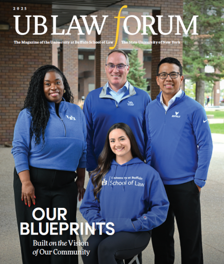 Cover of UB Law Forum magazine for 2025. The title appears at the top in large white letters with the word &ldquo;forum&rdquo; partially highlighted in yellow. Below the title, smaller text reads &ldquo;The Magazine of the University at Buffalo School of Law&rdquo; and &ldquo;The State University of New York.&rdquo; Four individuals wearing blue University at Buffalo apparel are posed in front of a brick building with trees in the background; one person is seated while three stand behind. At the bottom, bold white text reads &ldquo;OUR BLUEPRINTS,&rdquo; followed by smaller italic text: &ldquo;Built on the Vision of Our Community.&rdquo;. 