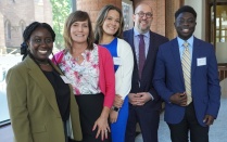 diverse discover law scholars posing for photo with Hodgson Russ employees. 