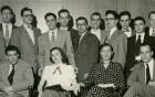 This is a group photo of the first Buffalo Law Review editorial board (1951-52). The Law Review's inaugural issue was published by a group of law students under the guidance of Professor Charles W. Webster. The issue was 350 pages and had an initial run of 100 copies without having any subscribers. The lead article in Volume 1 was written by Charles S. Desmond who was then an Associate Judge on the New York Court of Appeals and would later become the Chief Judge of New York's highest court. 