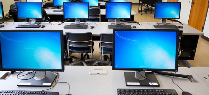 classroom full of computers. 