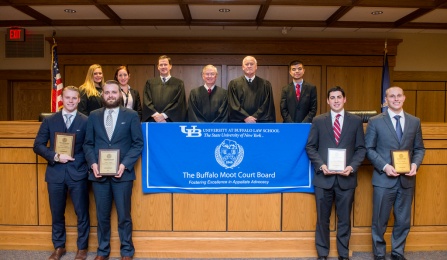 (back row) Victoria Hahn ’16, Kate Hartnet ’16, Hon. Eugene F. Pigott, Jr. ’73, Hon. H. Kenneth Schroeder, Jr. ’61 and Hon. Jeremiah J. McCarthy, Andrew DeMasters ’16. (front) Gerald Whalen ’16 and Steven Fisher '16, Patrick Leavy '16 and Steven Maffucci '16. 