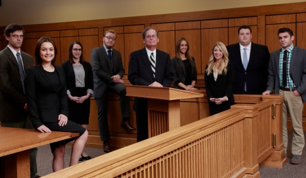 Left to right: Brandon White ’16, Farina Mendelson ’17, Elizabeth Parsons ’16, Jesse Pyle ’16, the late John R. Nuchereno, Kelly Pettrone ’17, Taylor Baker ’17, Brian Barnes ’17 and Matthew Paris ’17. 