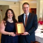 Pietra Zaffram '01 presenting the Outgoing Presidents Award to Brian Gwitt '98. 