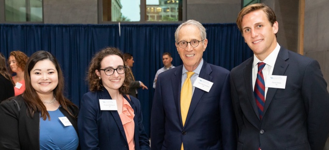 photo of Elizabeth R. David '19, Meghan L. McElligott '20, Hon. Paul L. Friedman '68, and Daniel J. Mattle '20. 