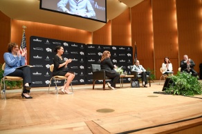 Zoom image: Joining Justice Ginsburg on stage: Elizabeth M. Fox-Solomon, President of the WNY Chapter of the Women’s Bar Association of the State of New York; Brittany A. Jones, President of the Minority Bar Association of WNY; Aviva Abramovsky, Dean of the University at Buffalo School of Law; Bridget M. O’Connell, President of the Bar Association of Erie County; and Scott C. Becker, President of the UB Law Alumni Association. 