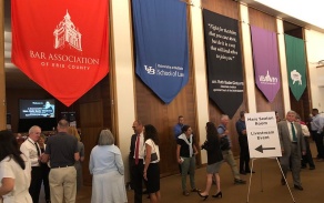 Zoom image: Colorful banners representing the evening's hosts decorated the venue's lobby. 