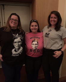 Zoom image: Members of the audience showing off their RBG garb. 