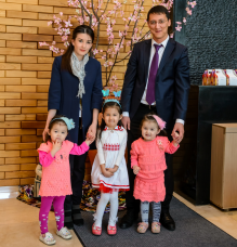 Zoom image: Vokhidov with his wife and three of his five children. 