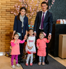 Vokhidov with his wife and three of his five children. 