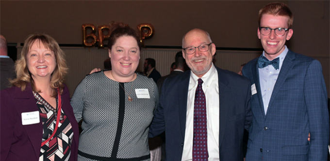 Left to right: Karen L. Nicolson '89, CEO for the Center for Elder Law and Justice; Dean Aviva Abramovsky; Garry M. Graber '78, and Christopher J. Phillips '20. Phillips spent the summer after his first year of law school at the Center for Elder Law and Justice with the support of a Garry Graber fellowship. 