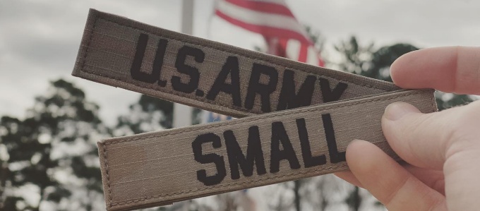badges that read US Army Small. 