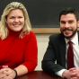 Anne Joynt '05 and Ryan Parisi '10 sitting at a table. 