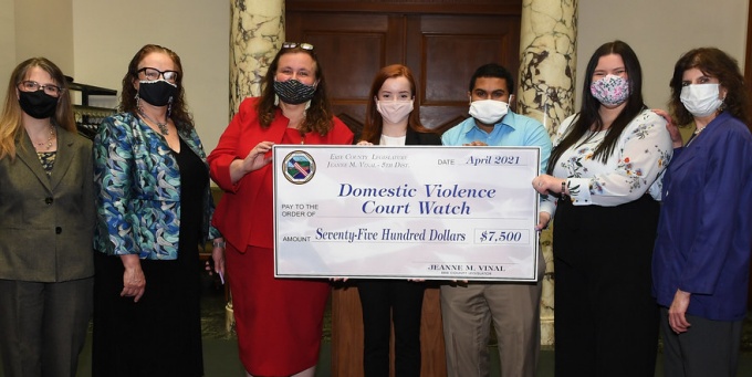 Erie County Legislator Jeanne Vinal ’89 presents a check to our Family Violence and Women’s Rights Clinic to support the development of a Domestic Violence Court Watch program in Erie County. 
