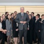 phil halpern standing in the middle of a large group of students. 