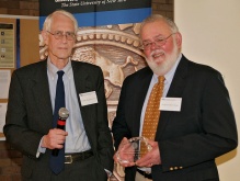 Zoom image: James Magavern and Barry B. Boyer attending a 2010 reception for emeritus faculty at the School of Law. 