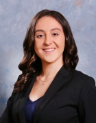 young woman posing for a portrait photo. 