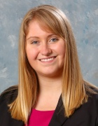 portrait photo of a woman smiling. 