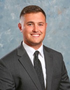 man wearing suit in a portrait photo. 