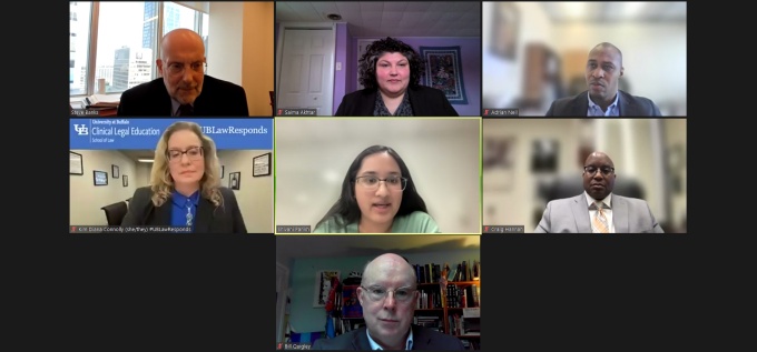 Zoom screen of 7 people participating in an online webinar. 