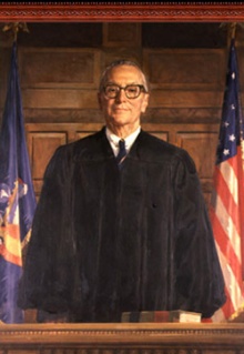 a painting of man wearing judges robe. 