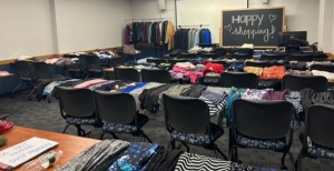 nicely organized tables that display clothing. 