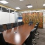 board room with long table and chairs. 