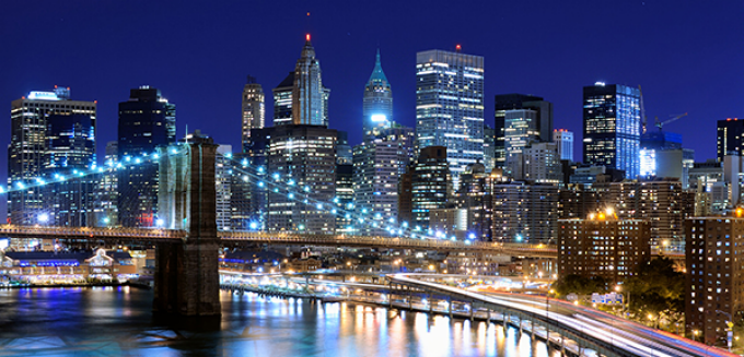 view of NYC skyline at dusk. 