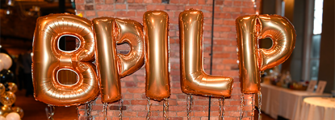 balloon letters that spell out BPILP. 