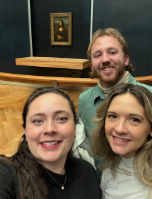 Young adults inside a museum. 
