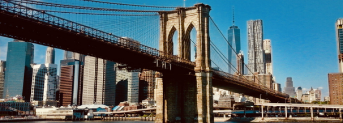 Large urban bridge into New York City. 