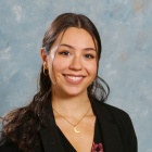 Young woman, smiling. 