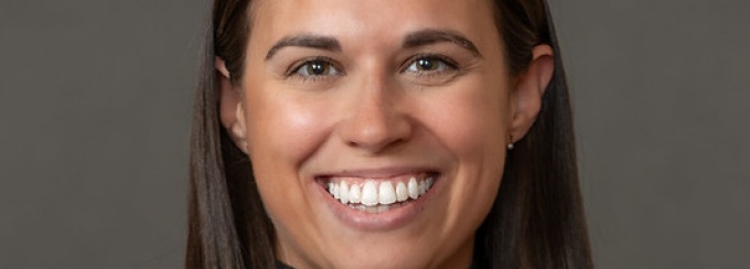 Professional headshot of Ashley Abbott. 