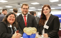 photo of students attending a welcome reception. 