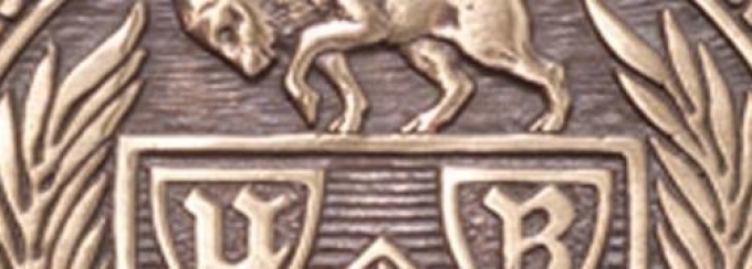 closeup photo of UB's academic seal. 