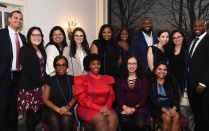 a group of diverse law students, smiling. 