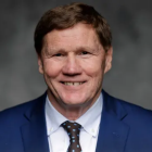 Mark Murphy wearing blue suit jacket and tie. 