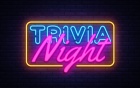 neon sign that says Trivia Night. 