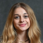 Professional portrait of Alexa Weber.