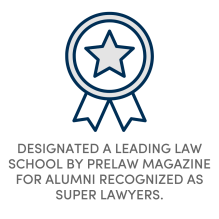 A graphic of an award ribbon outlined in dark blue with a gray star in the center. Below the graphic, text reads: “Designated a leading law school by PreLaw Magazine for alumni recognized as Super Lawyers.”. 